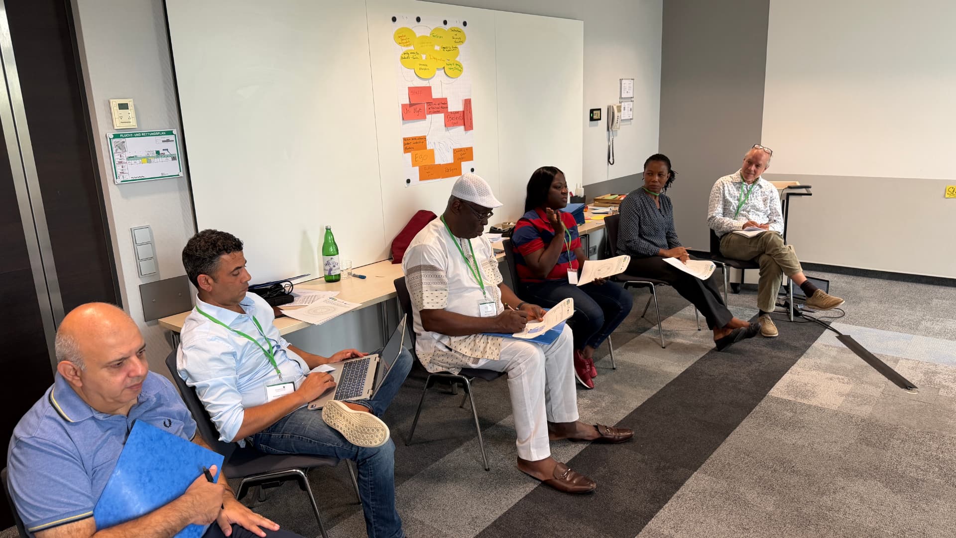 CoPoweR workshop participants in discussion